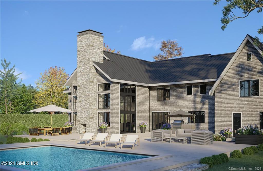 90 Half Mile Road Darien, CT 06820 - Photo 2 of 2 a front view of a house with garden