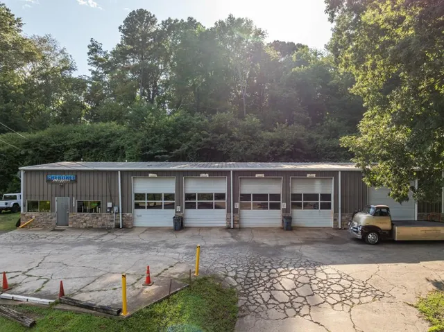 a view of a car park in front of house