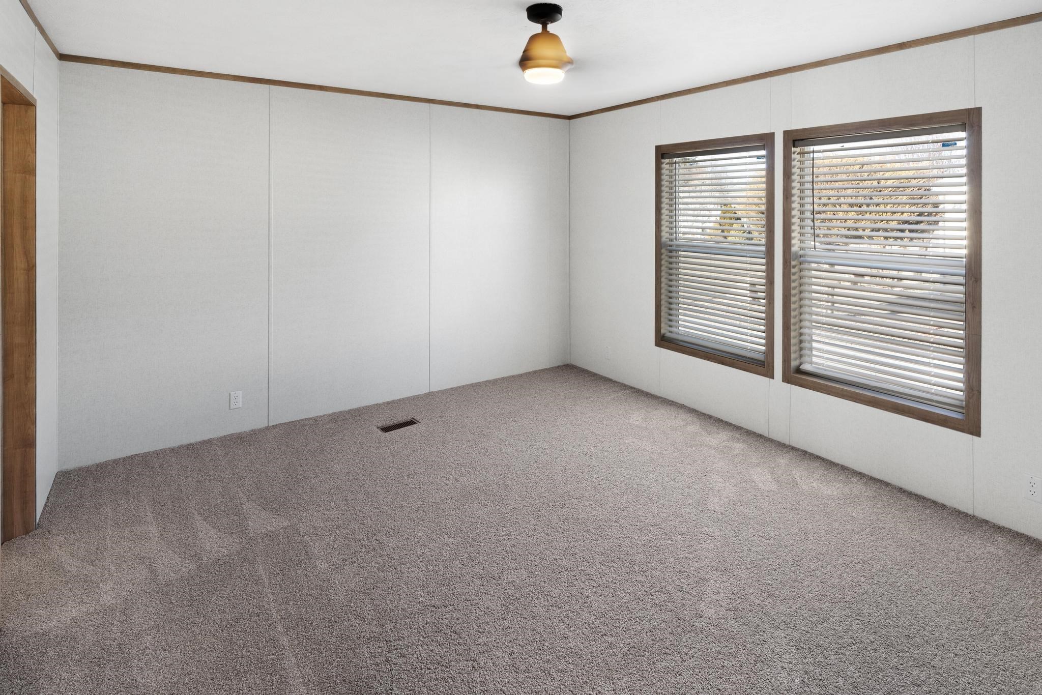 3195 F Road, Unit 8 Grand Junction, CO 81504 - Photo 15 of 26 a view of an empty room with a window