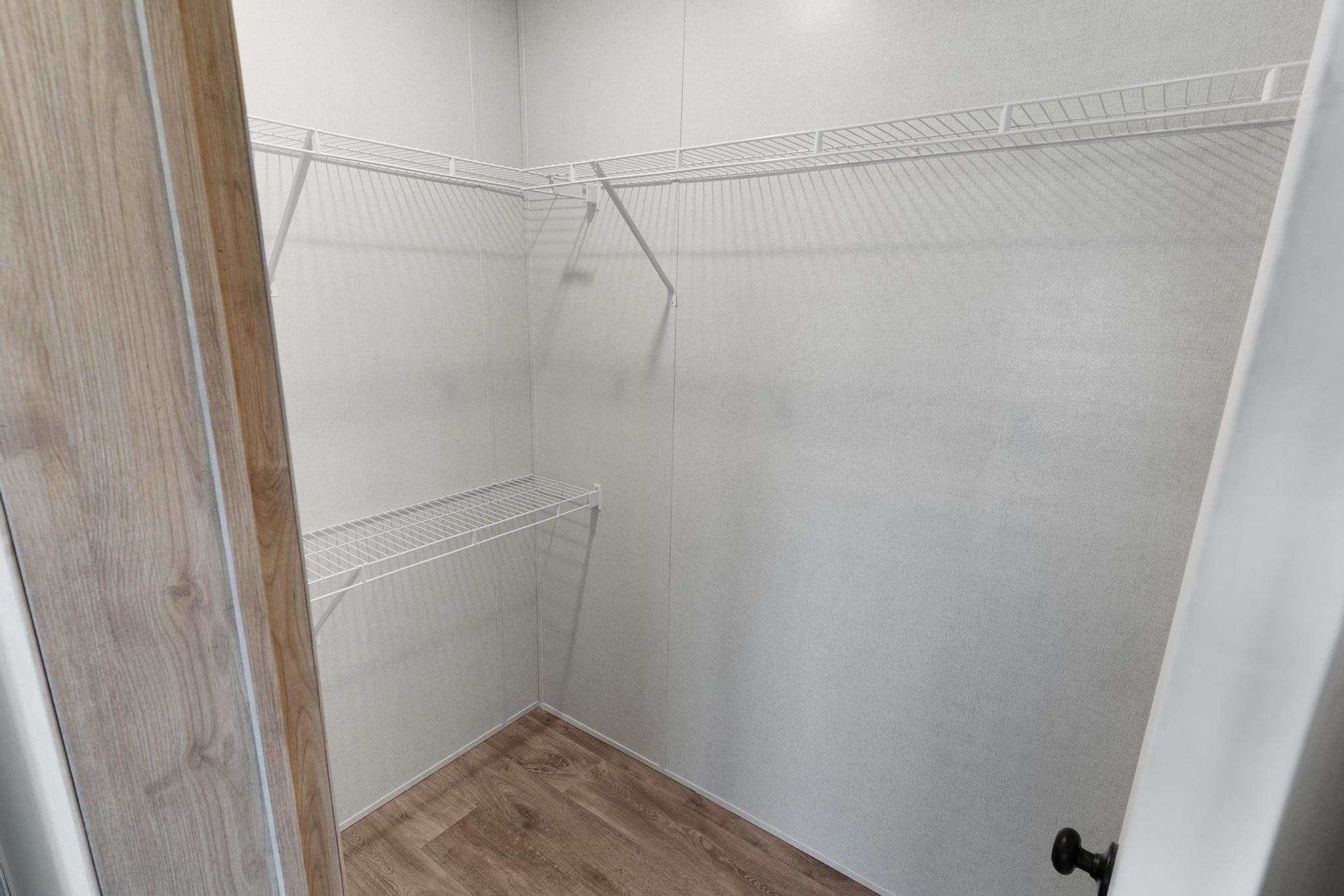 3195 F Road, Unit 8 Grand Junction, CO 81504 - Photo 19 of 26 a view of a room with racks on the wall