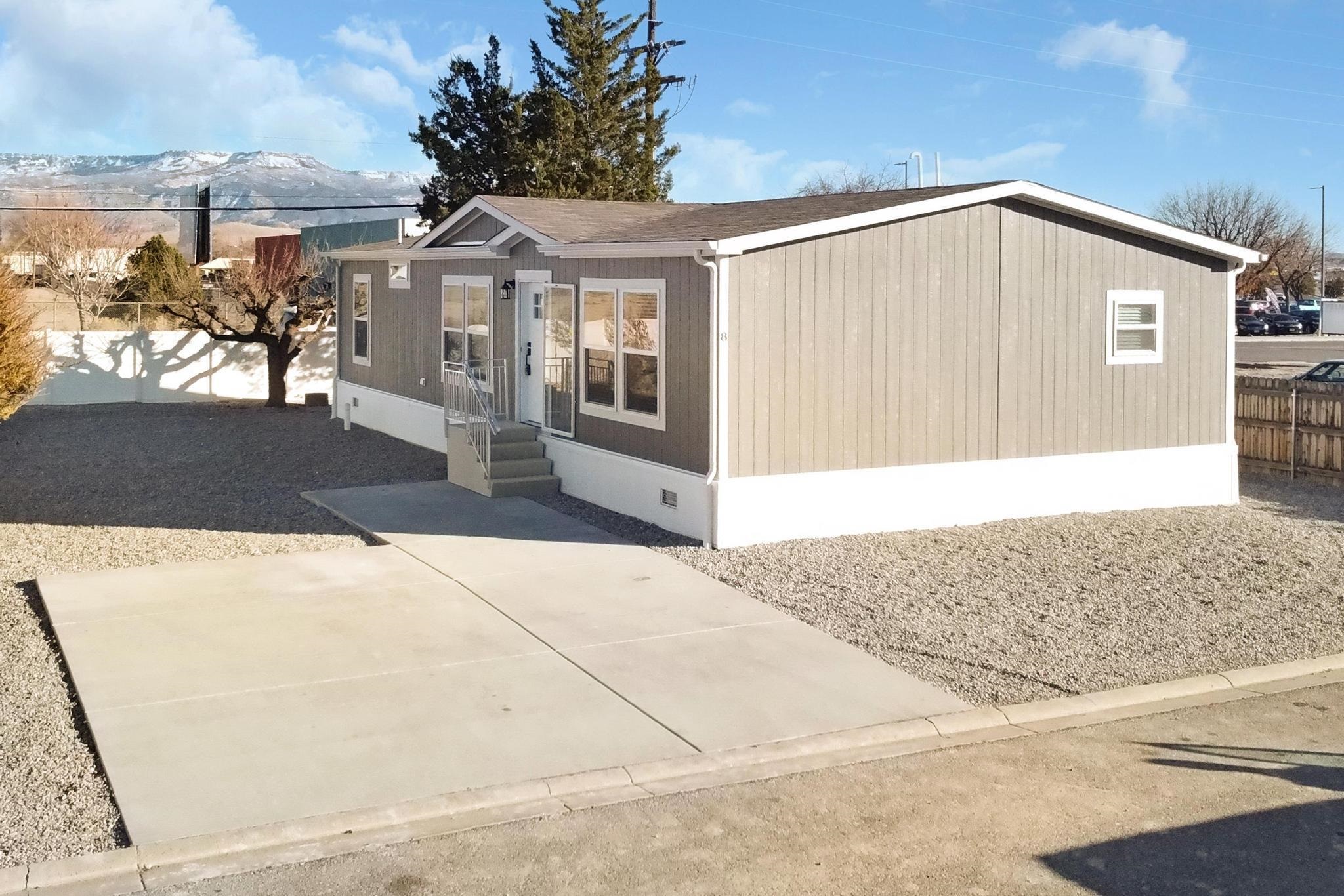 3195 F Road, Unit 8 Grand Junction, CO 81504 - Photo 2 of 26 a front view of a house