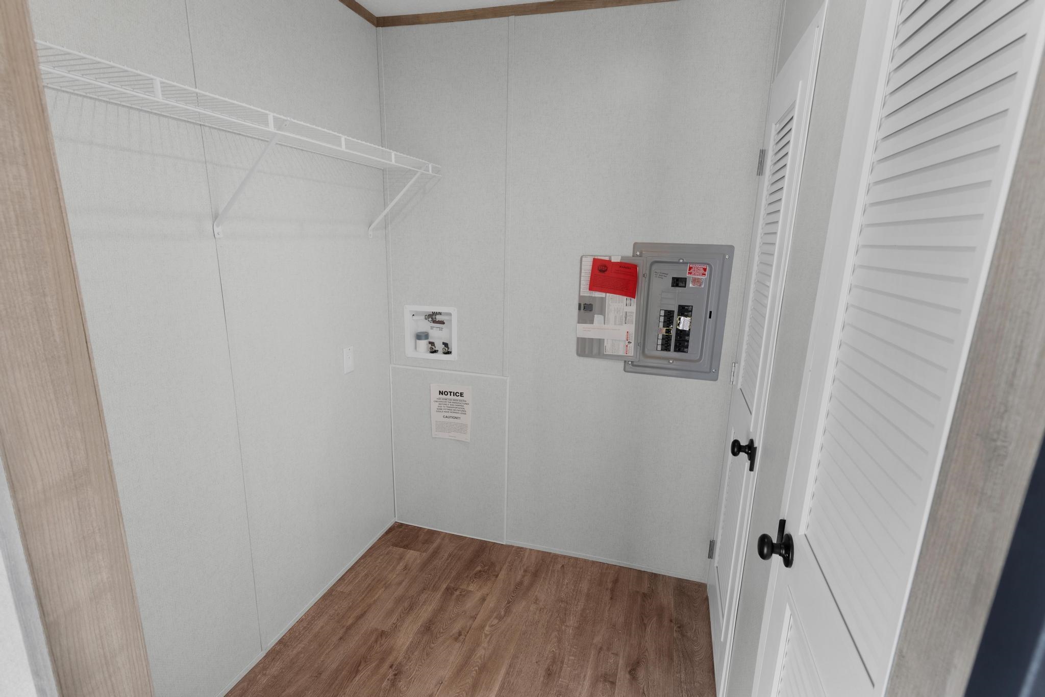 3195 F Road, Unit 8 Grand Junction, CO 81504 - Photo 21 of 26 a storage room with wooden floor