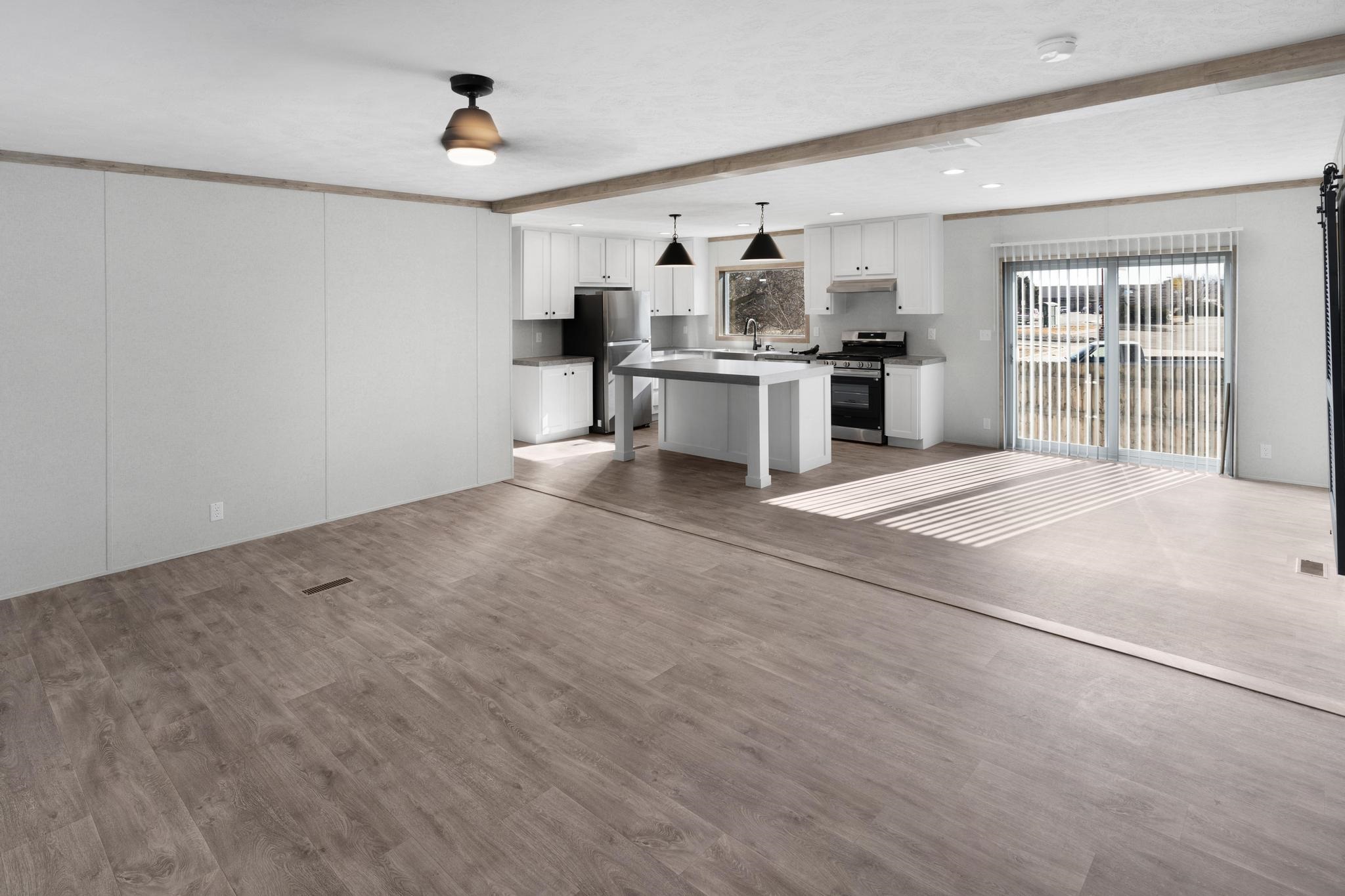 3195 F Road, Unit 8 Grand Junction, CO 81504 - Photo 4 of 26 a view of kitchen with stainless steel appliances refrigerator oven and cabinets