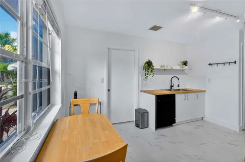 a bathroom with a sink and a bathtub