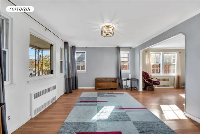 a view of a livingroom with furniture and windows