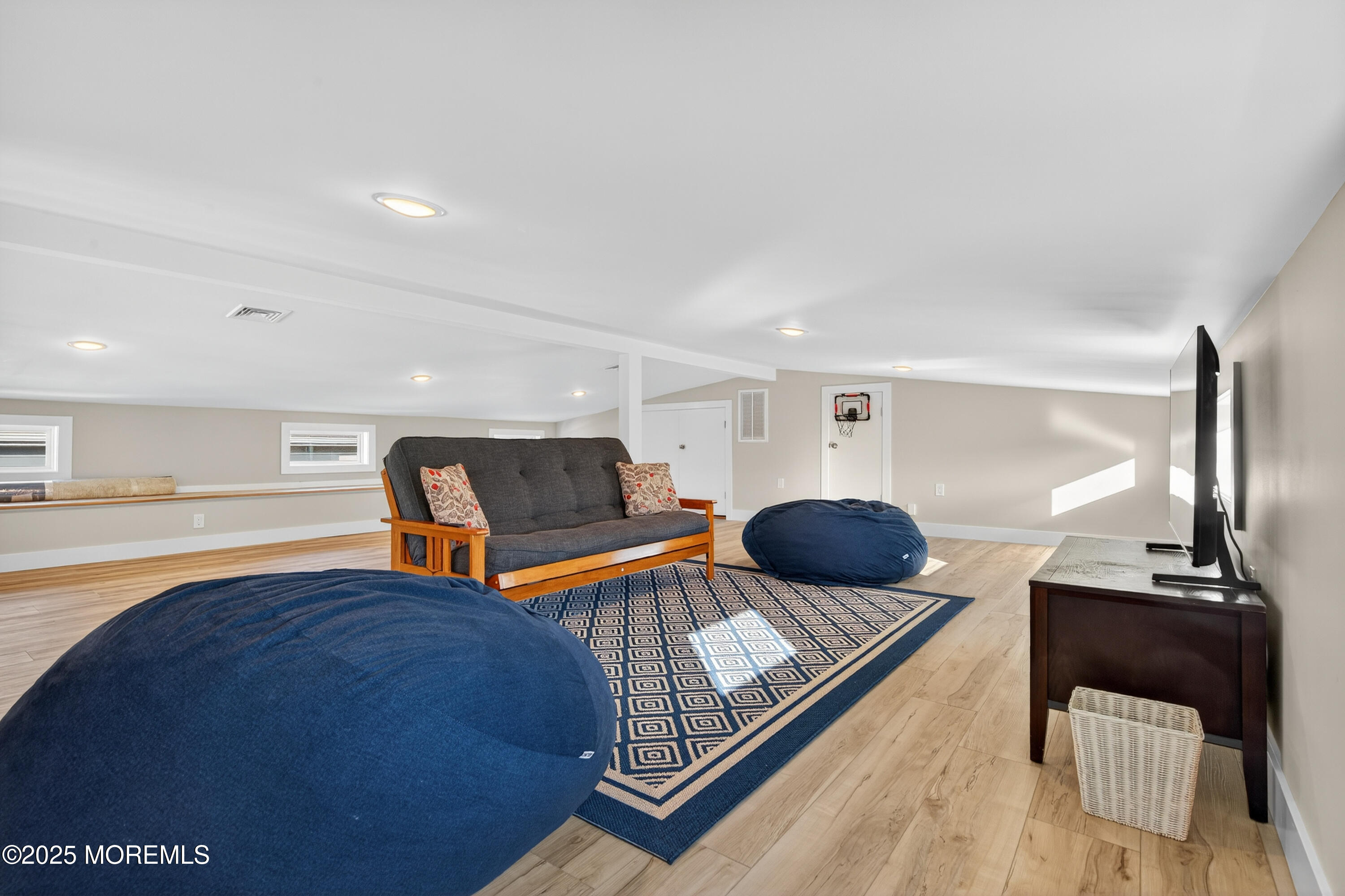 A3255 Goa Way Lavallette, NJ 08735 - Photo 28 of 34 a bedroom with furniture and a wooden floor