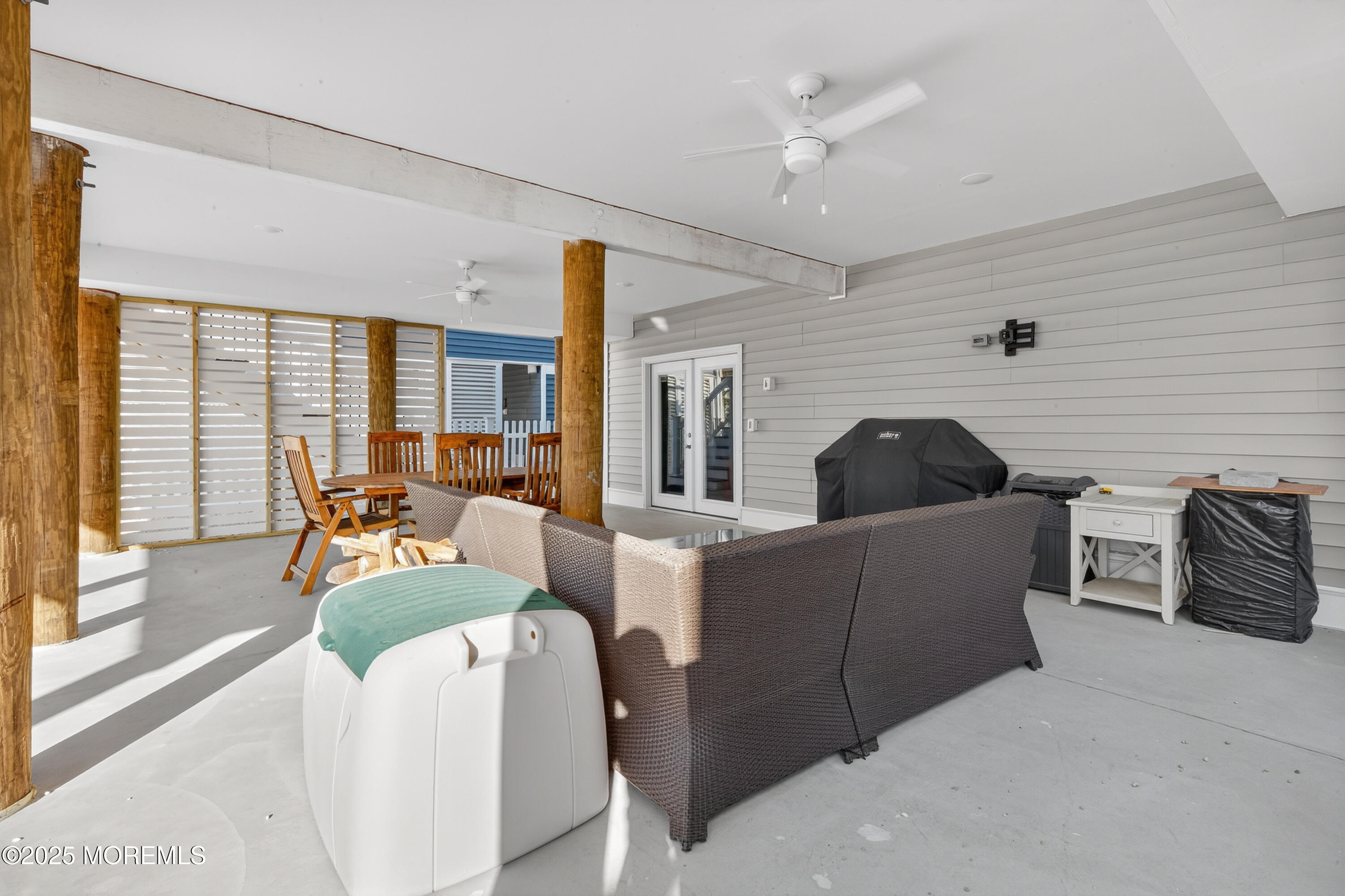 A3255 Goa Way Lavallette, NJ 08735 - Photo 30 of 34 a living room with furniture and a large window