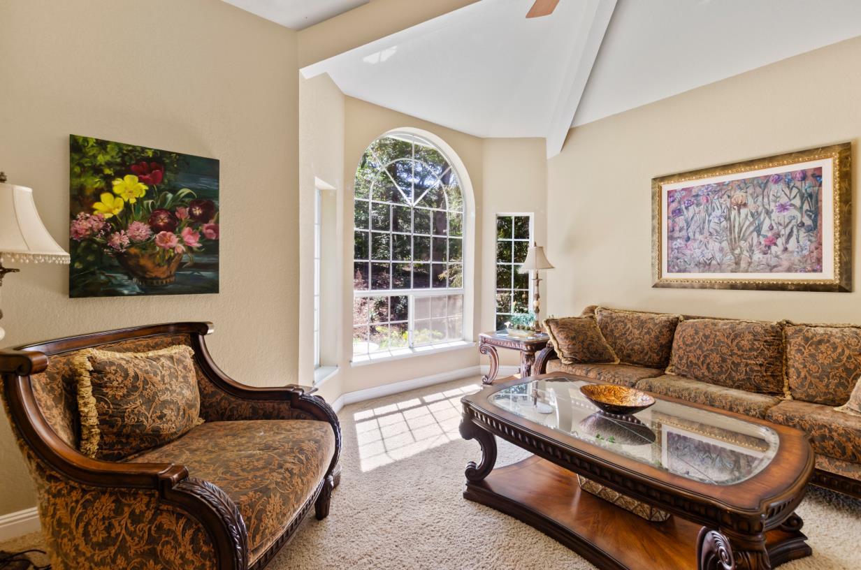 3720 Four Springs Drive Rescue, CA 95672 - Photo 13 of 34 a living room with furniture and a large window