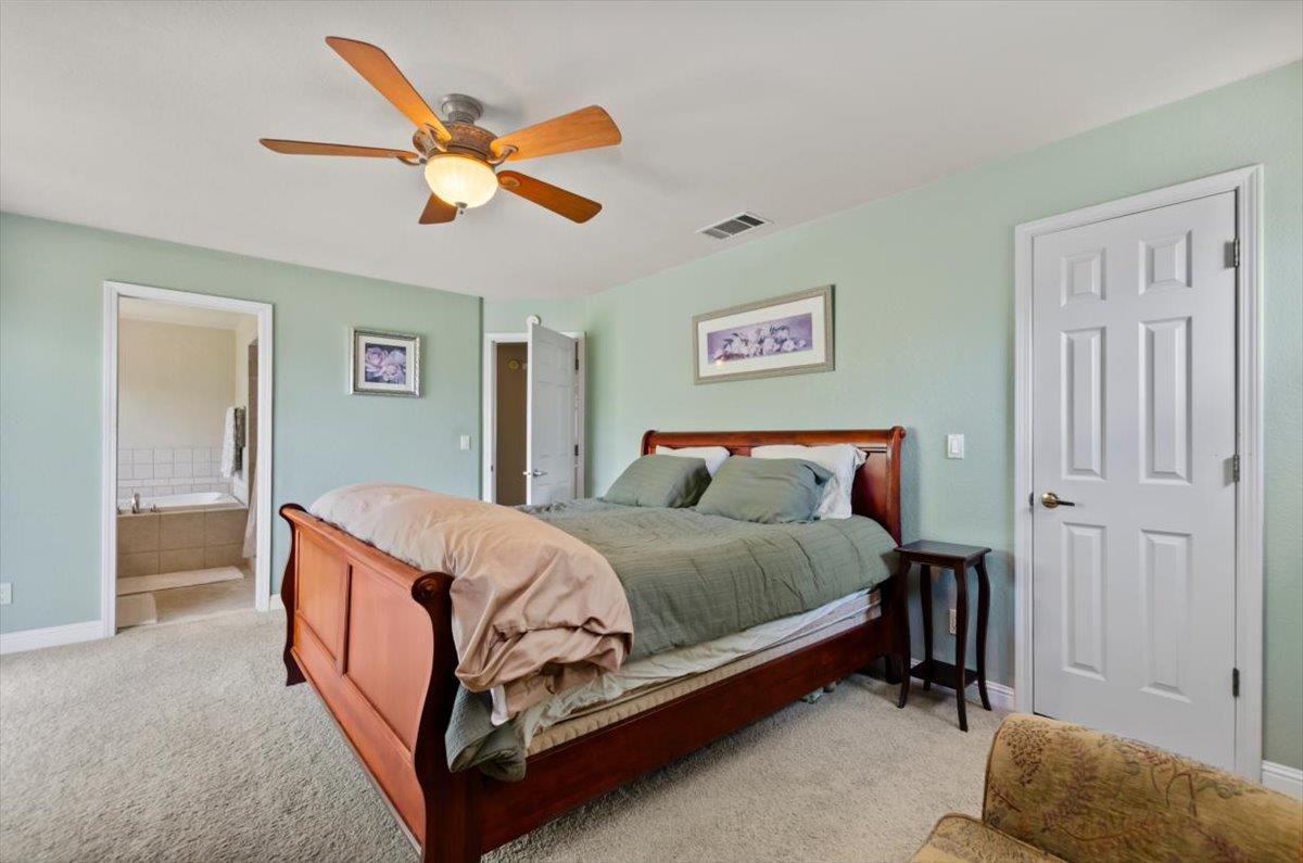 3720 Four Springs Drive Rescue, CA 95672 - Photo 14 of 34 a bed room with a bed and a ceiling fan