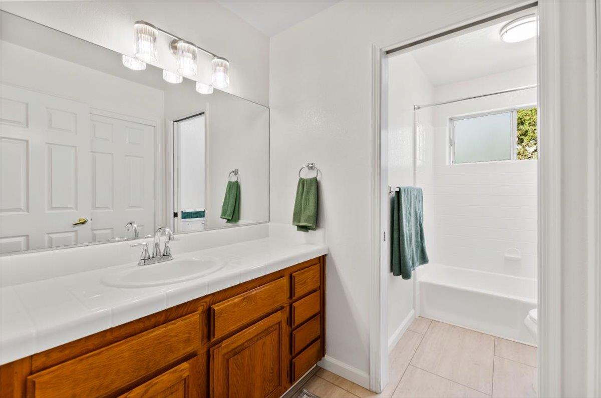3720 Four Springs Drive Rescue, CA 95672 - Photo 18 of 34 a bathroom with a sink vanity and a mirror