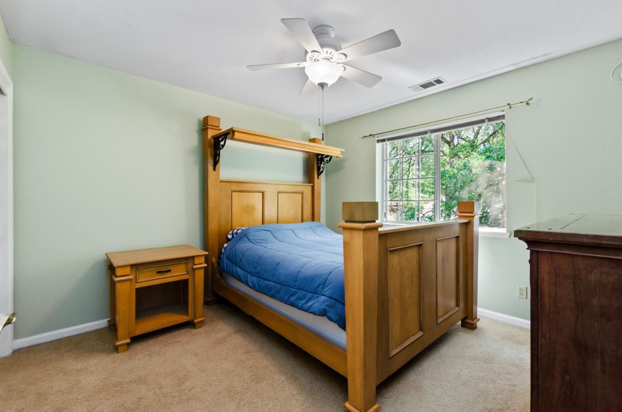 3720 Four Springs Drive Rescue, CA 95672 - Photo 19 of 34 a bedroom with a bed and a window