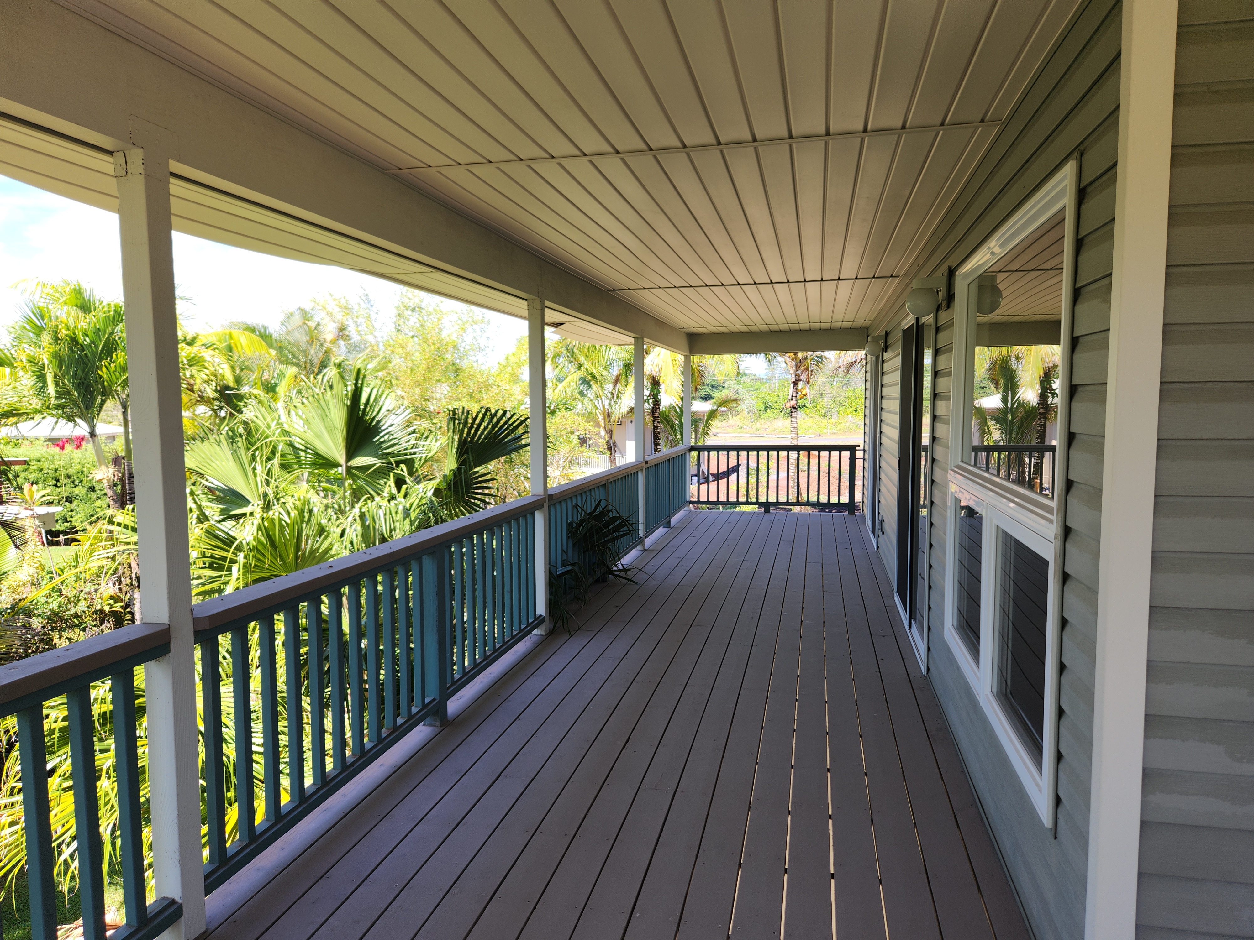 15-974 Lemiwai Road Keaau, HI 96749 - Photo 19 of 30 a view of a porch with wooden floor and outdoor space