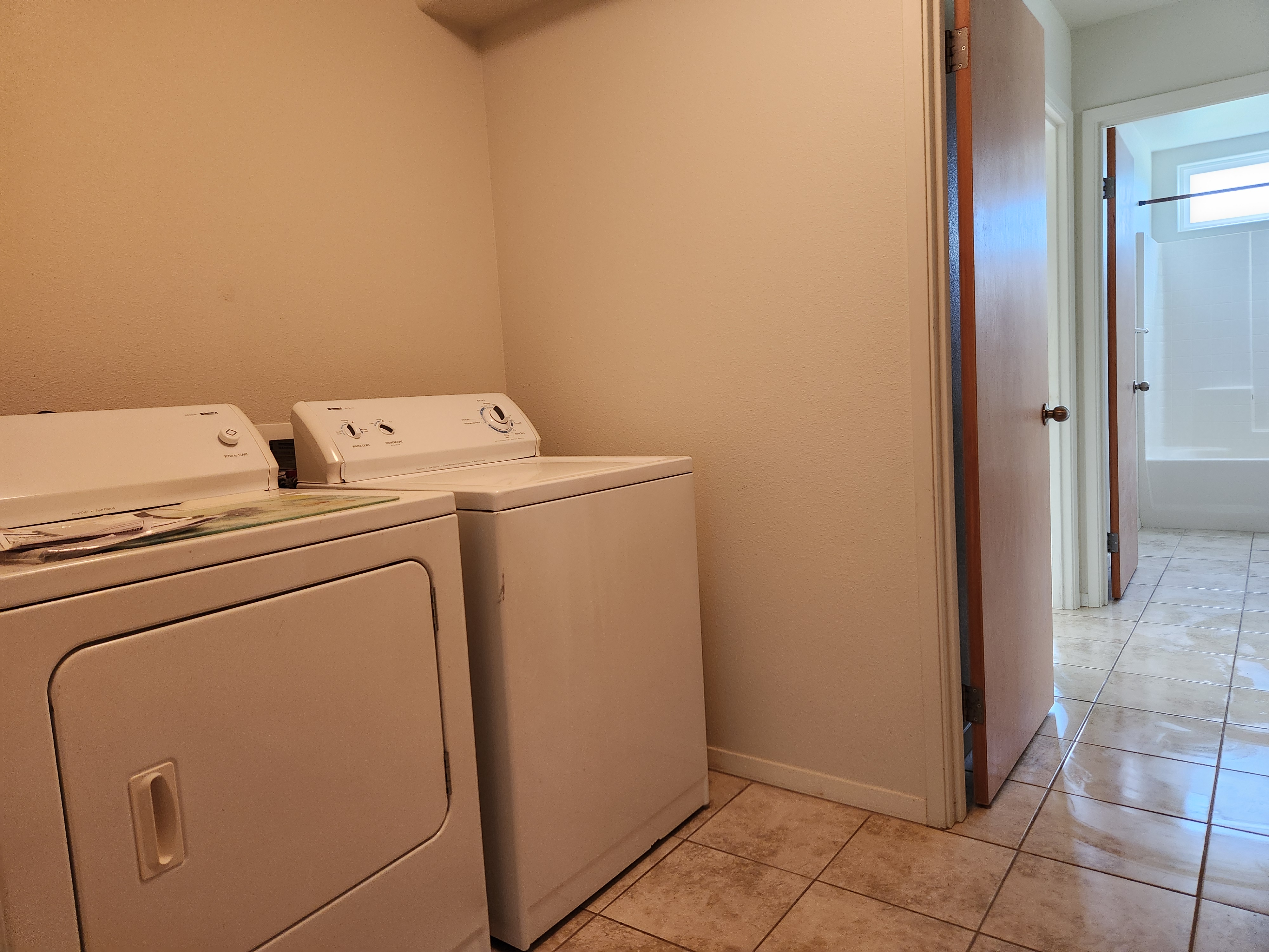 15-974 Lemiwai Road Keaau, HI 96749 - Photo 25 of 30 a utility room with dryer and washer