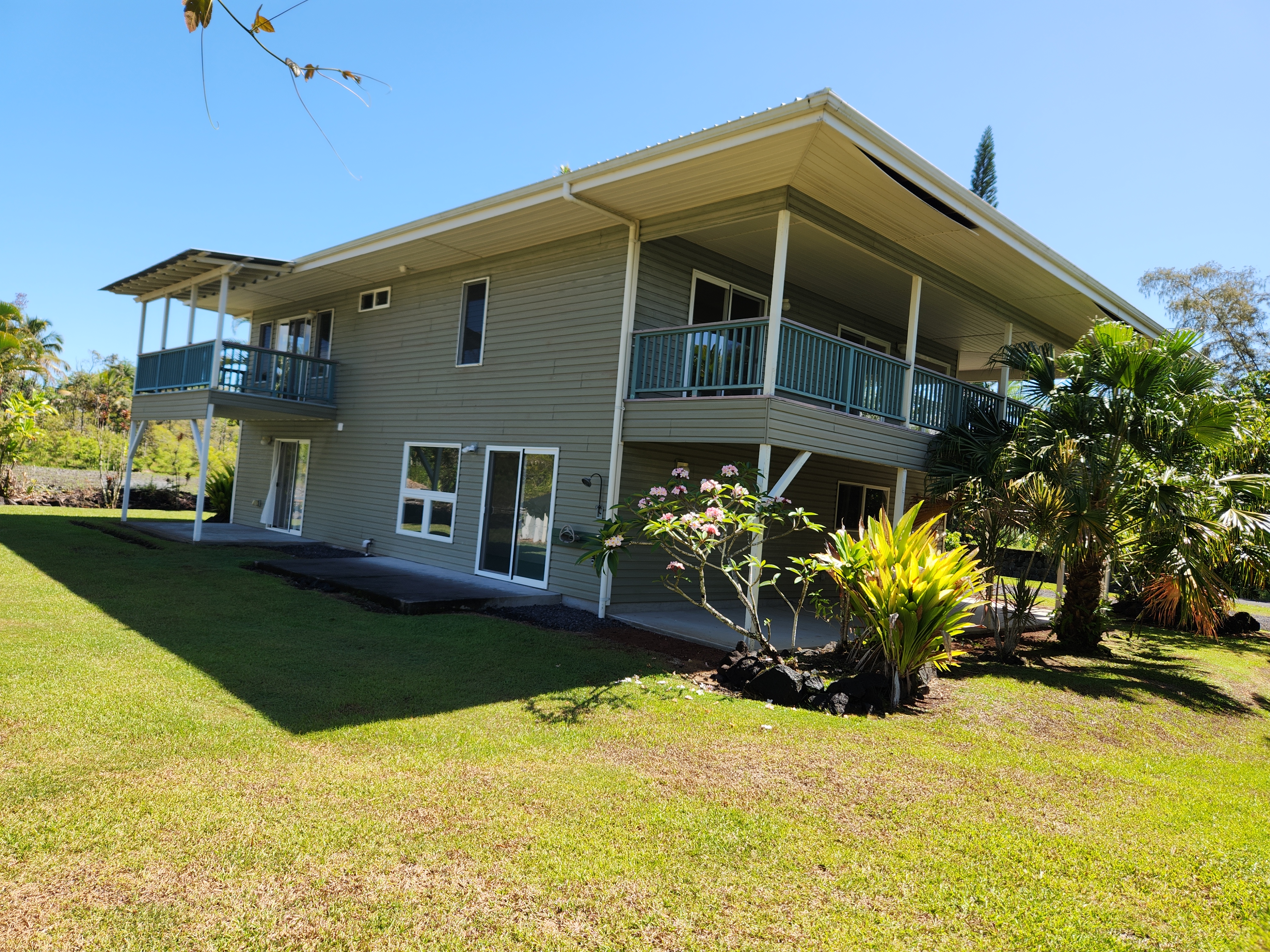 15-974 Lemiwai Road Keaau, HI 96749 - Photo 27 of 30 a front view of a house with a yard