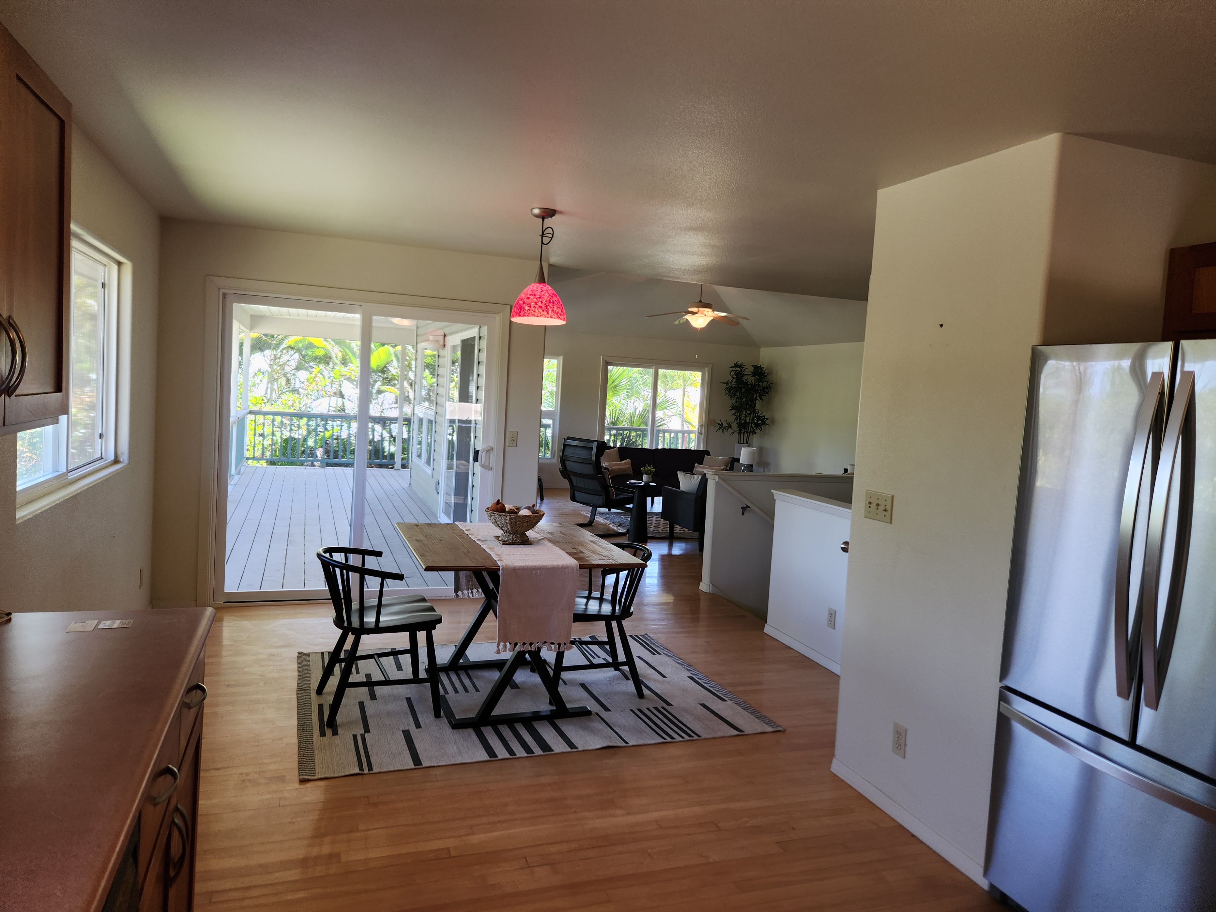 15-974 Lemiwai Road Keaau, HI 96749 - Photo 4 of 30 a view of a dining room with furniture window and wooden floor
