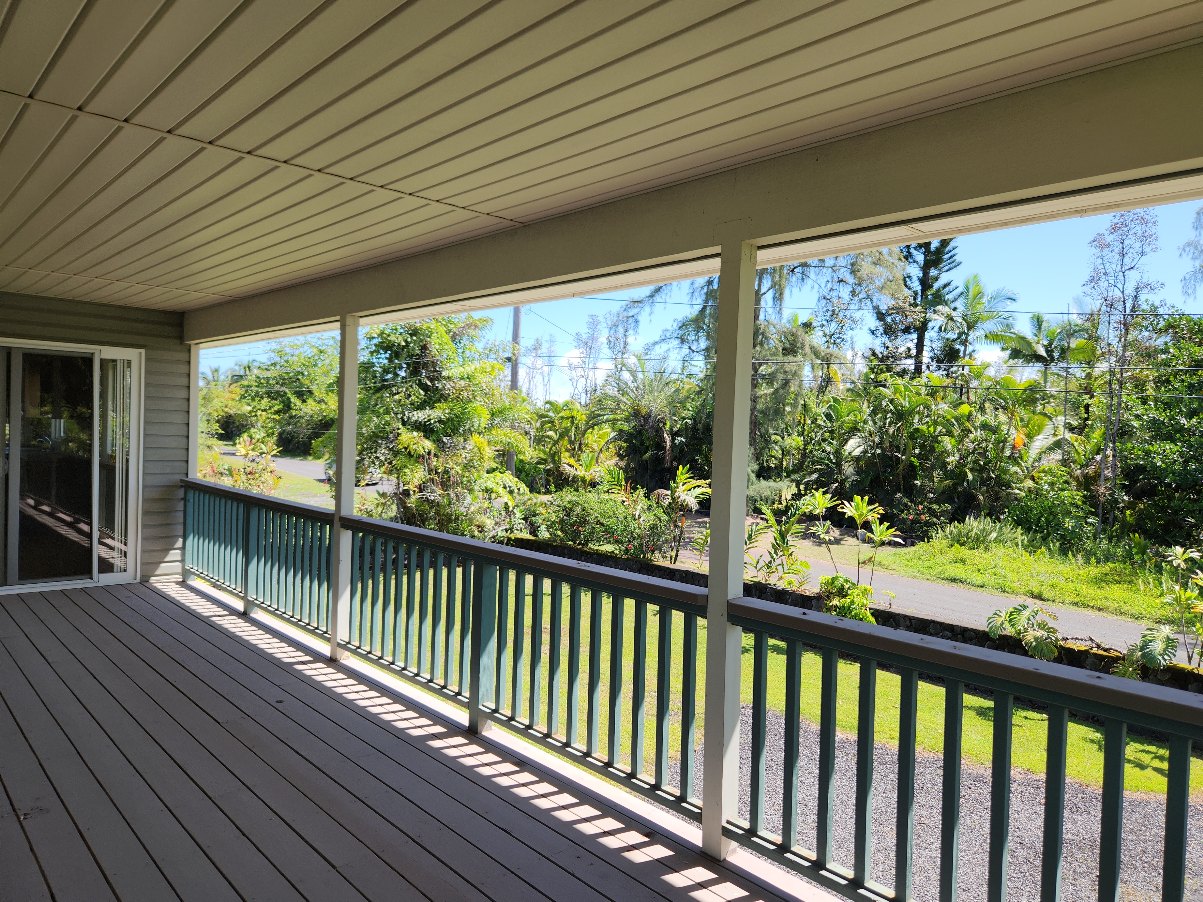 15-974 Lemiwai Road Keaau, HI 96749 - Photo 5 of 30 a view of a balcony with wooden floor
