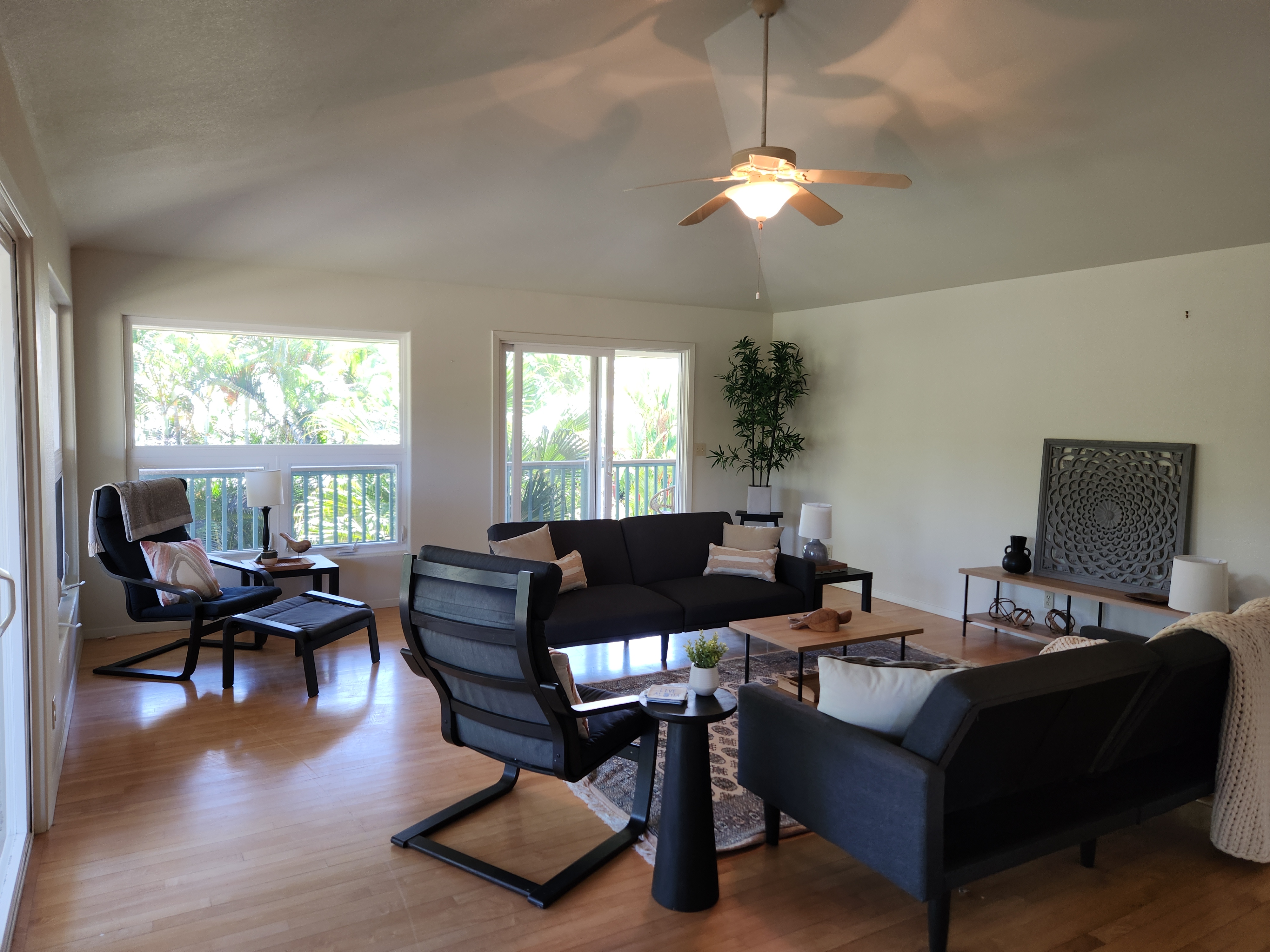 15-974 Lemiwai Road Keaau, HI 96749 - Photo 6 of 30 a living room with furniture and a large window