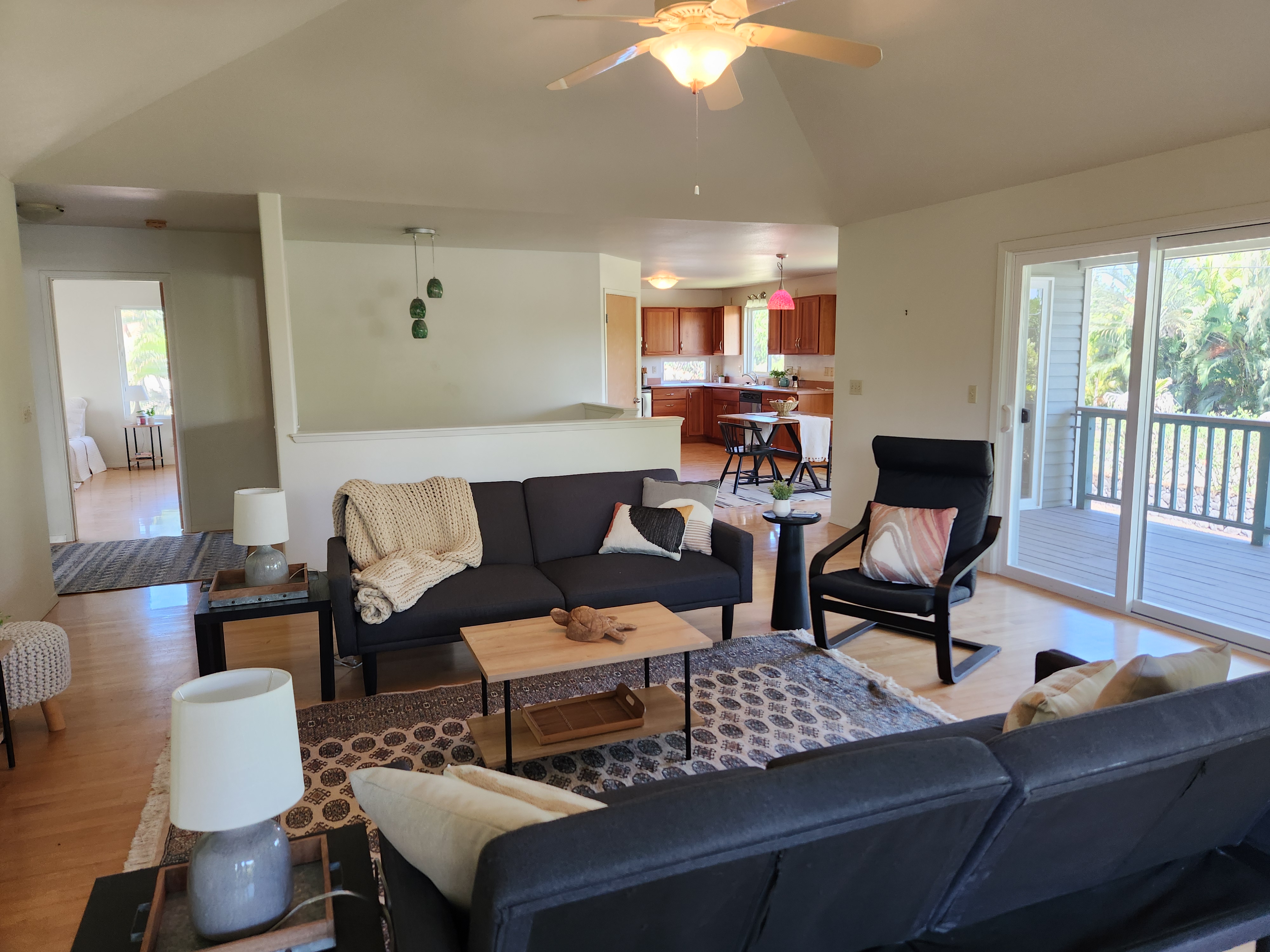 15-974 Lemiwai Road Keaau, HI 96749 - Photo 7 of 30 a living room with furniture and a fireplace