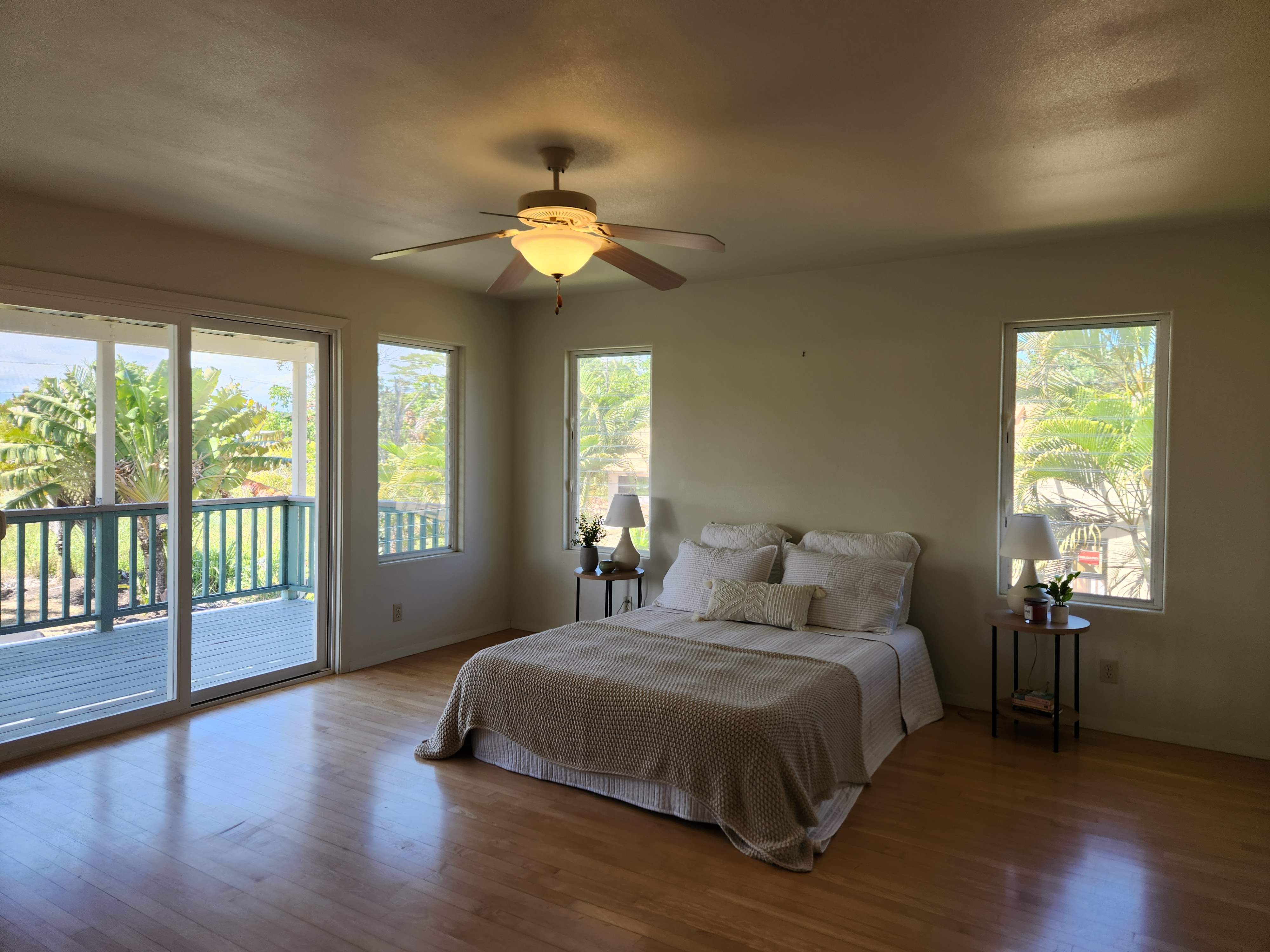 15-974 Lemiwai Road Keaau, HI 96749 - Photo 9 of 30 a bedroom with a bed and a window