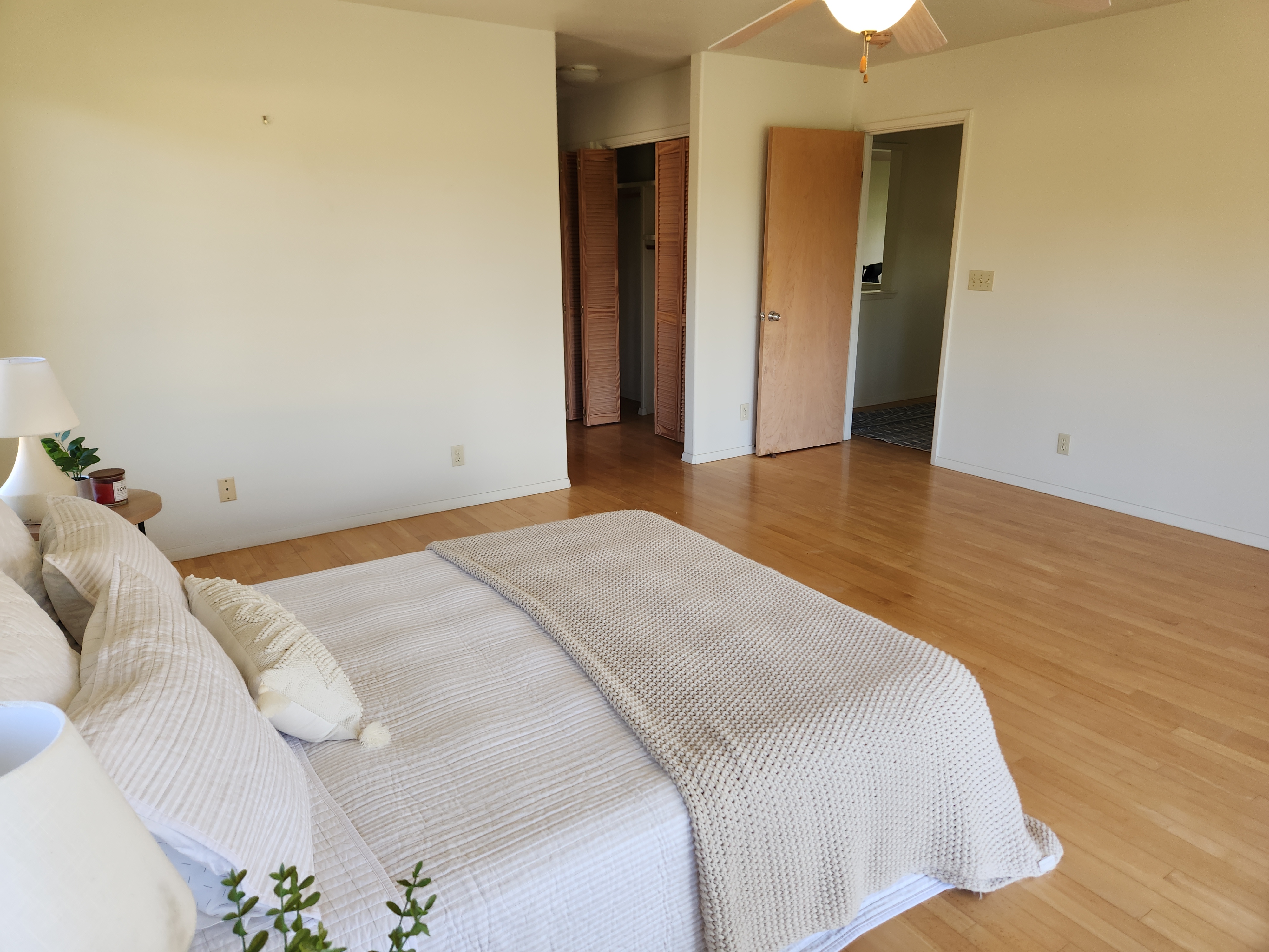 15-974 Lemiwai Road Keaau, HI 96749 - Photo 10 of 30 a bedroom with a bed and wooden floor