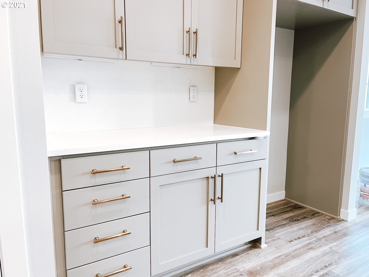2917 North Mccanta Way Ridgefield, WA 98642 - Photo 9 of 22 a kitchen with white cabinets and white appliances