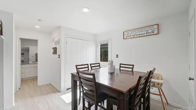 a view of a dining room with furniture