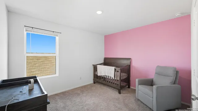 a livingroom with furniture and a window