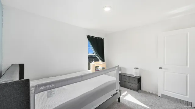 a bathroom with a bathtub and a vanity