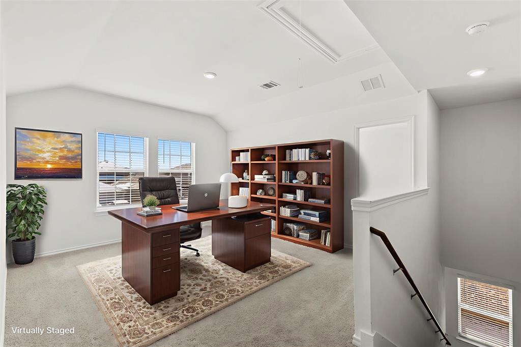 809 Trough Street Royse City, TX 75189 - Photo 18 of 38 a work room with furniture a rug and a potted plant