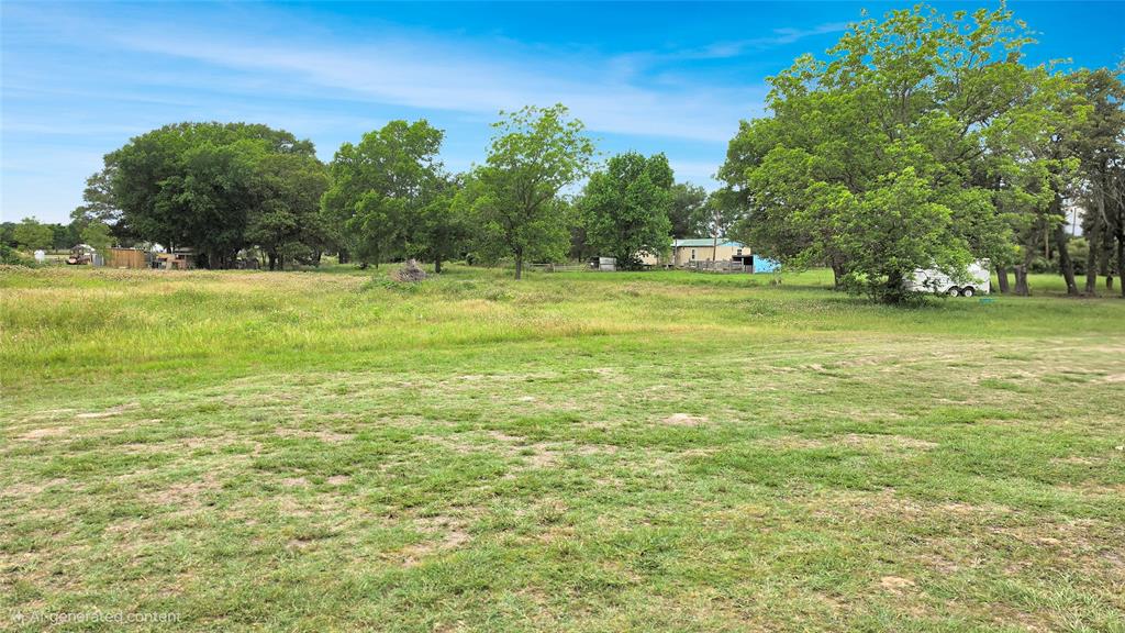 14628 Fm Road Scurry, TX 75158 - Photo 11 of 14 a view of yard with swimming pool and green space