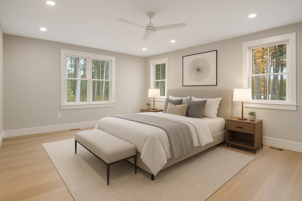 55 Country Farm Road Framingham, MA 01701 - Photo 6 of 8 a bedroom with a large bed and windows