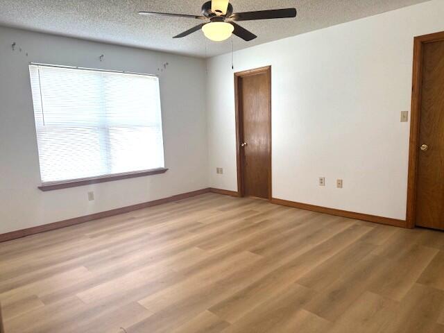 2252 Prytania Circle Navarre, FL 32566 - Photo 13 of 26 an empty room with a window and a fan