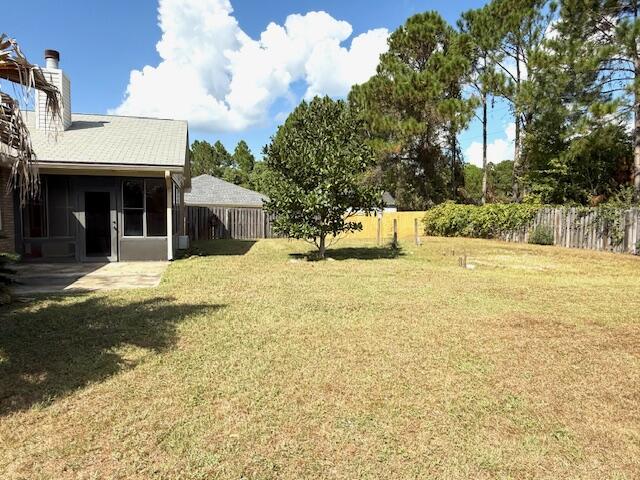 2252 Prytania Circle Navarre, FL 32566 - Photo 21 of 26 a swimming pool with trees in front of it