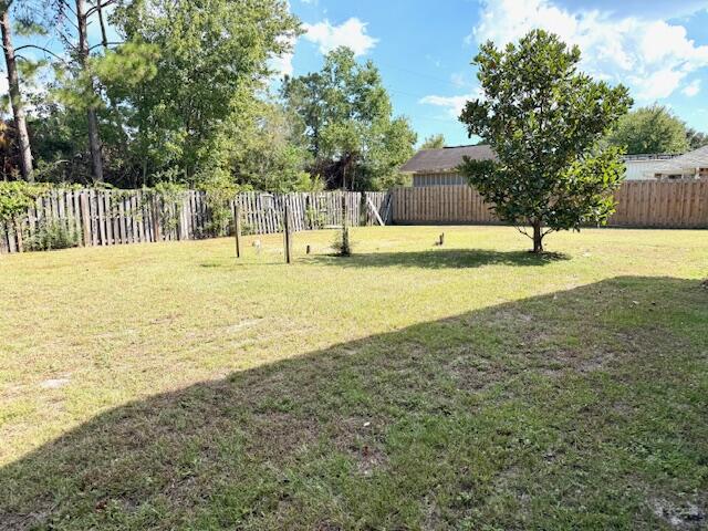 2252 Prytania Circle Navarre, FL 32566 - Photo 22 of 26 a view of an outdoor space and yard