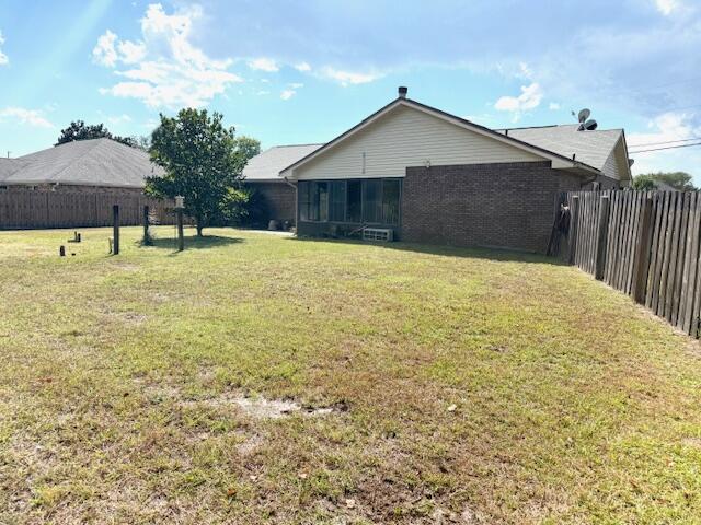 2252 Prytania Circle Navarre, FL 32566 - Photo 23 of 26 a house view with a backyard space