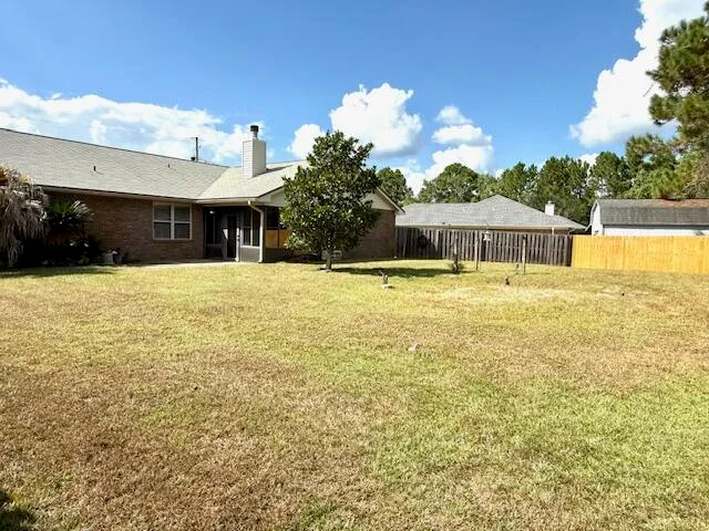 a view of a house with a swimming pool