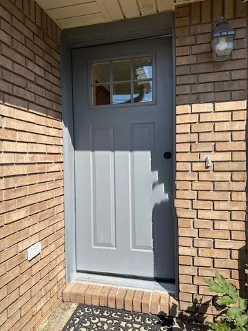 a front view of a house with a door