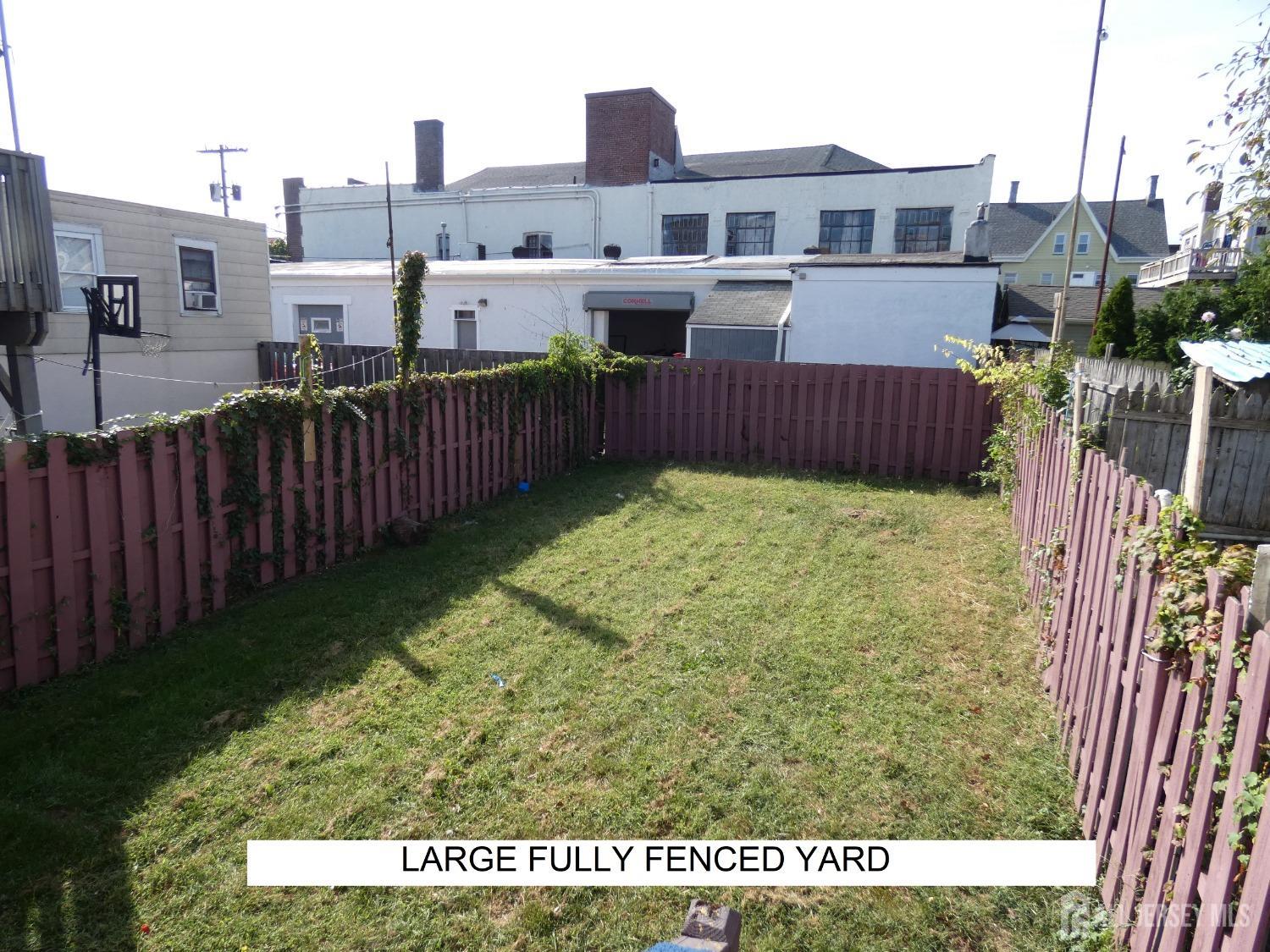 355 High Street Perth Amboy, NJ 08861 - Photo 18 of 19 a view of a house with backyard and deck
