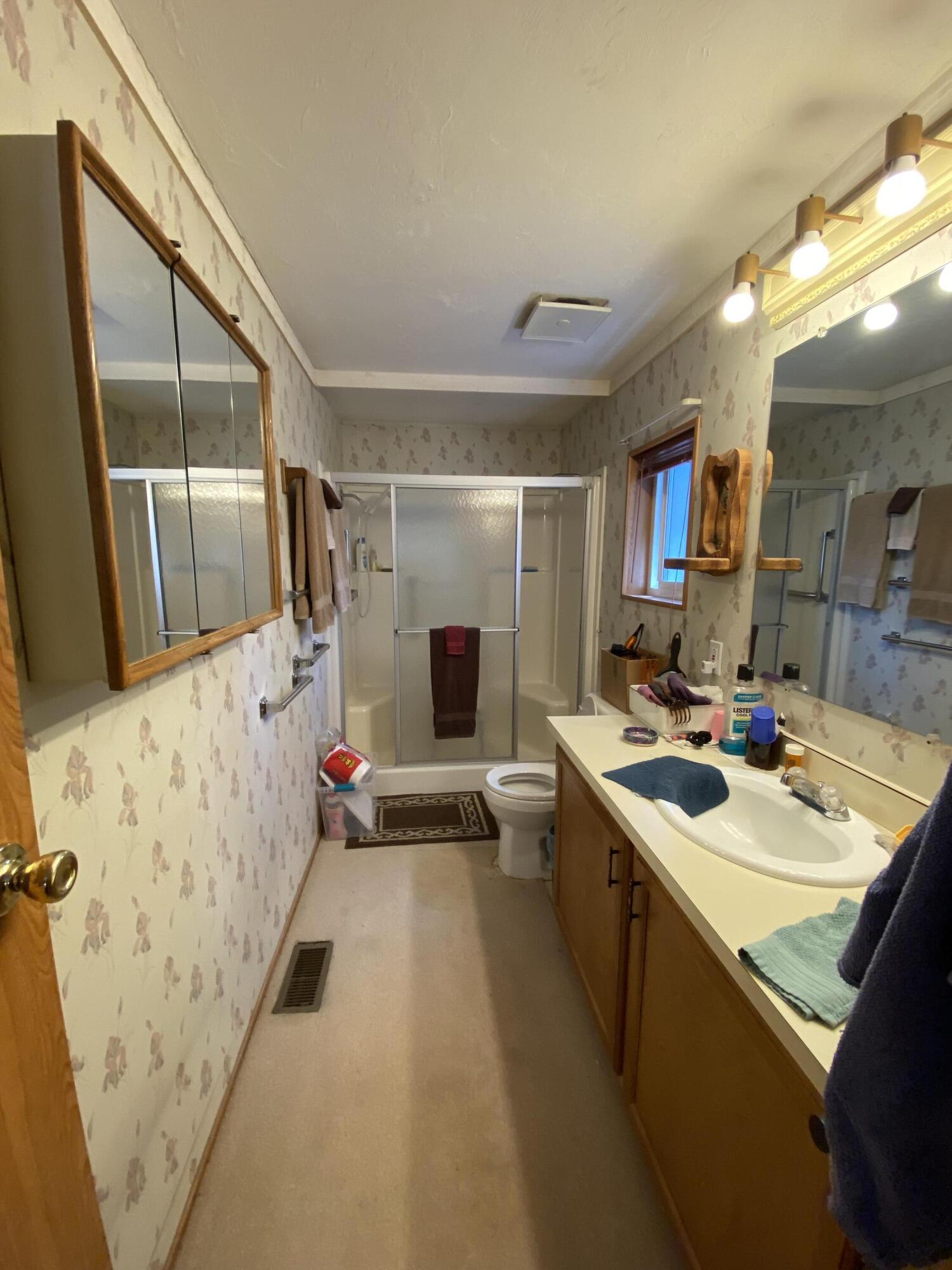 52401 Ammon Road La Pine, OR 97739 - Photo 14 of 21 a living room with stainless steel appliances kitchen island granite countertop a sink stove and refrigerator