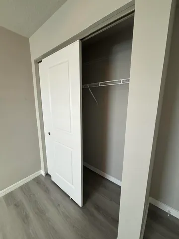 a view of an empty walk in closet