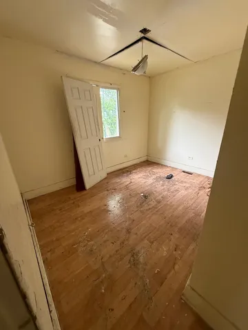 a view of empty room with windows