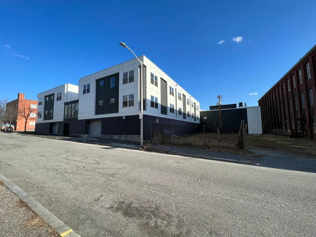 a view of a building with large windows
