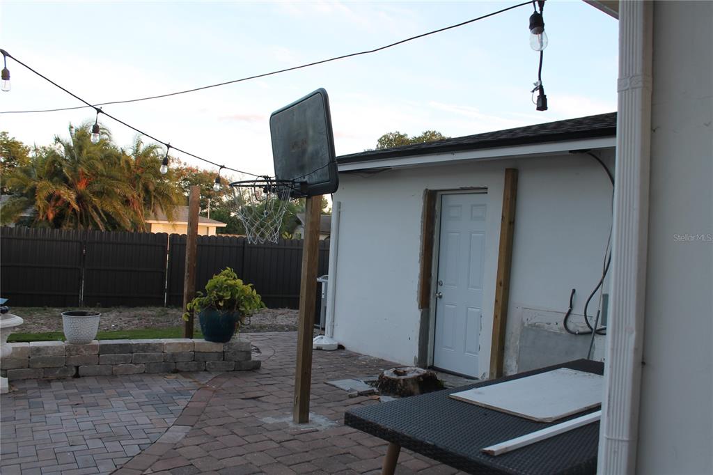 7423 Star Dust Drive Port Richey, FL 34668 - Photo 19 of 23 a backyard of a house