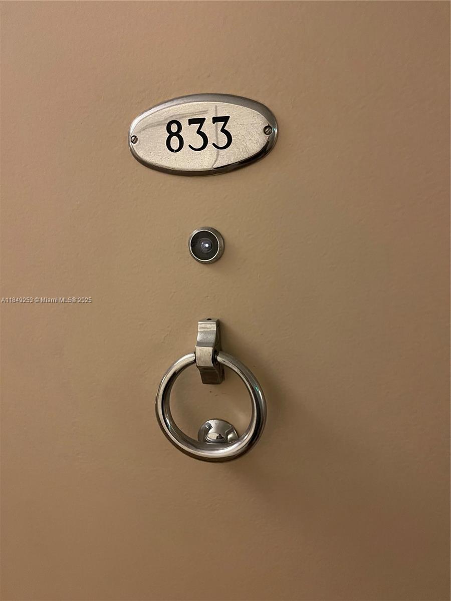 100 Lincoln Road, Unit 833 Miami Beach, FL 33139 - Photo 30 of 30 a bathroom with a sink and a mirror