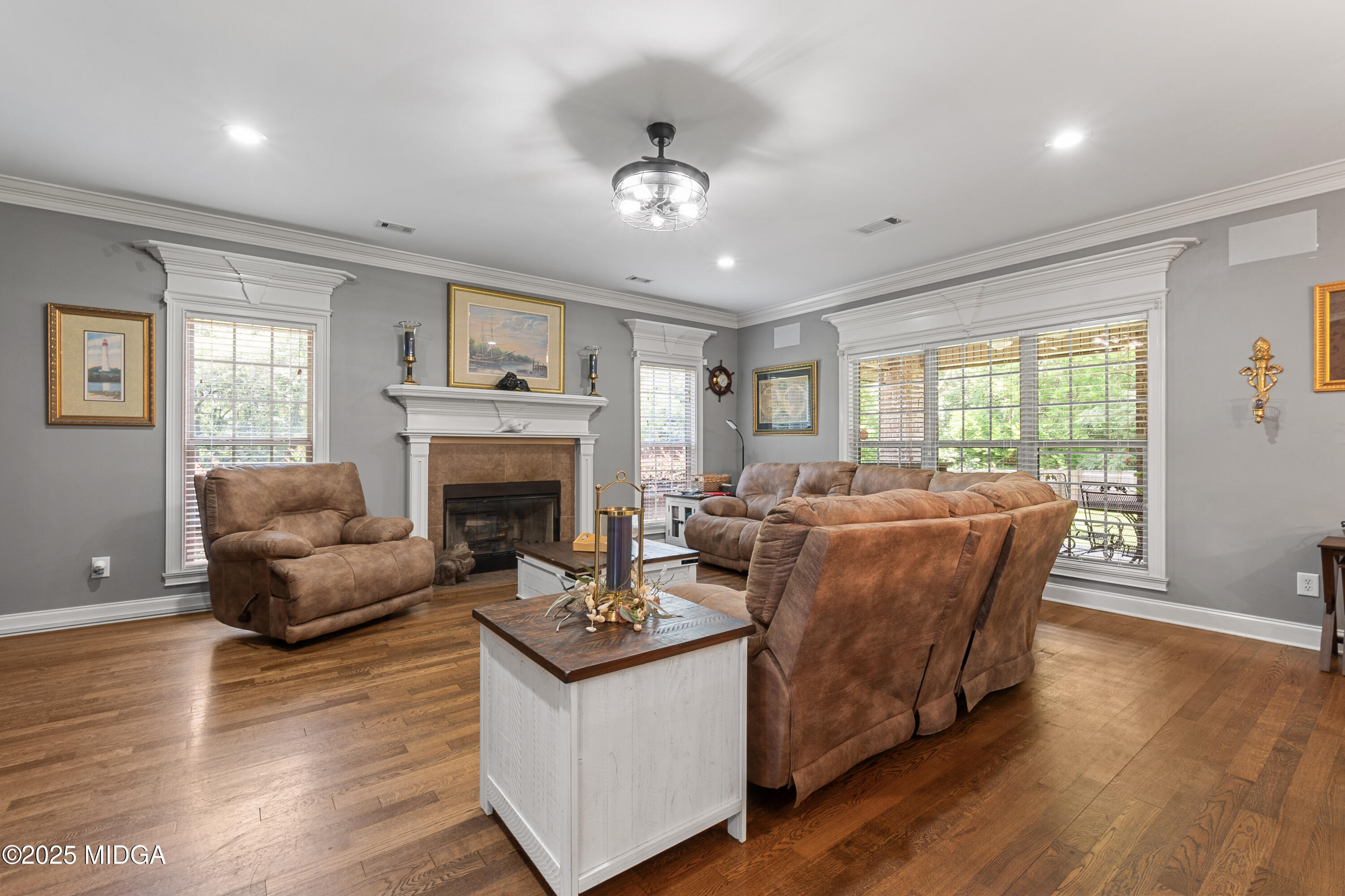 105 River Rock Court Perry, GA 31069 - Photo 17 of 61 a living room with furniture and a fireplace