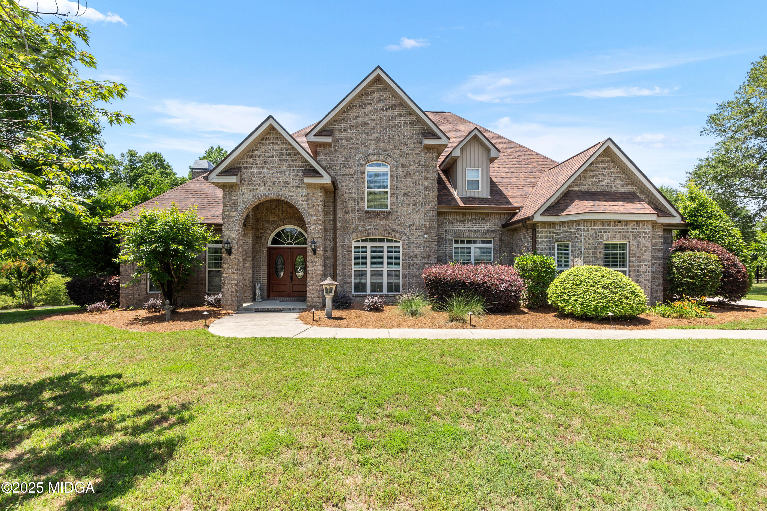 105 River Rock Court Perry, GA 31069 - Photo 2 of 61 a view of a house with swimming pool and porch