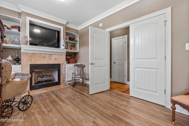 a kitchen with stainless steel appliances granite countertop a refrigerator and a stove