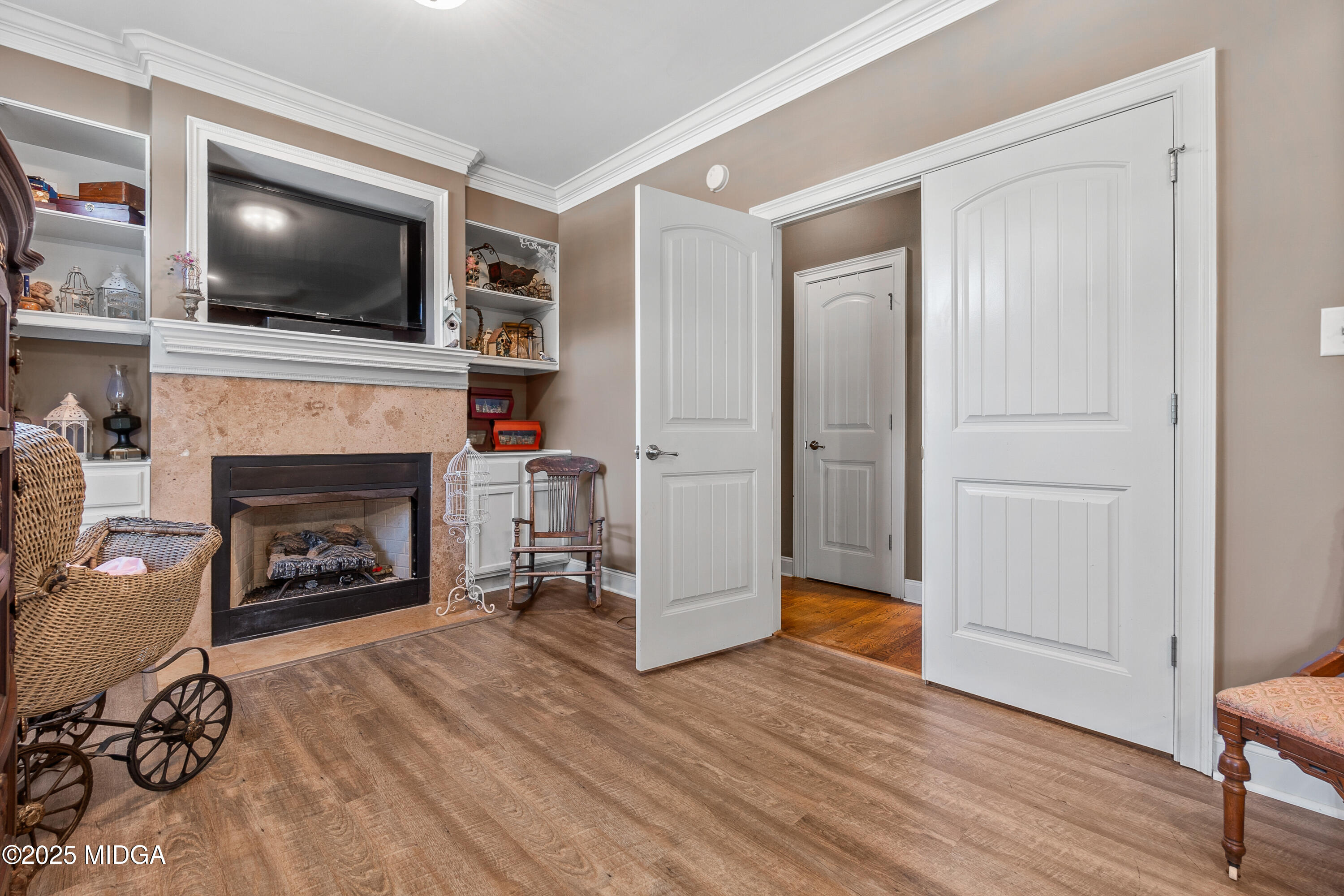105 River Rock Court Perry, GA 31069 - Photo 33 of 61 a living room with furniture and a fireplace