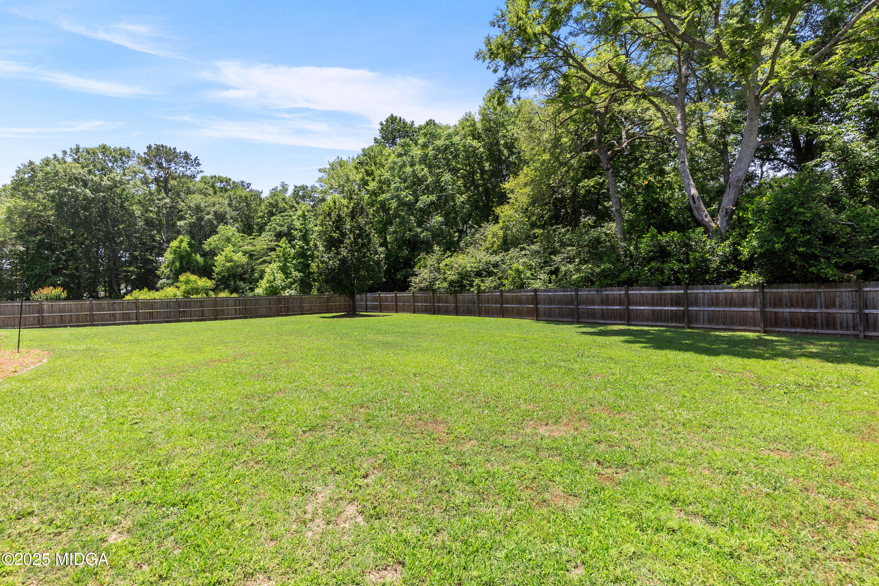 105 River Rock Court Perry, GA 31069 - Photo 58 of 61 a view of outdoor space with swimming pool and green space