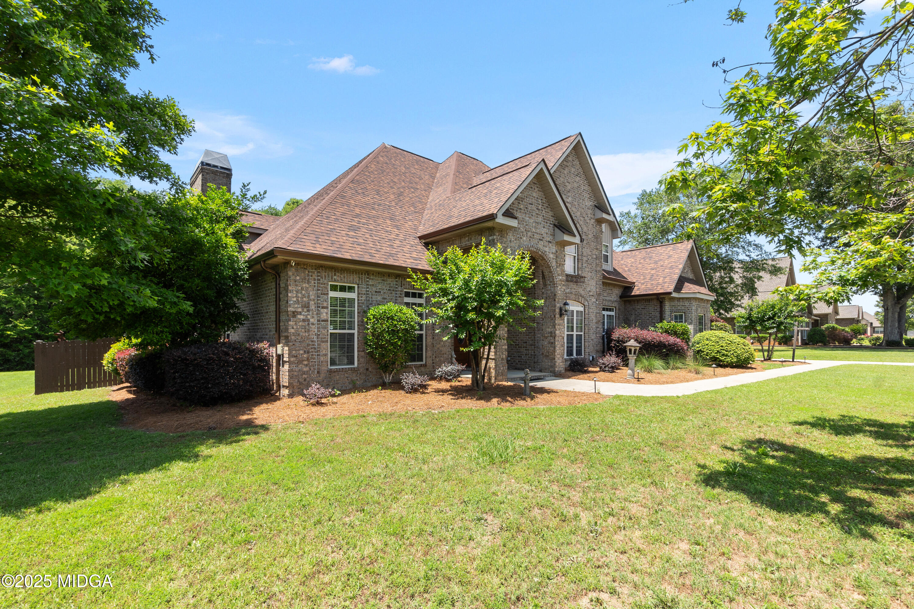 105 River Rock Court Perry, GA 31069 - Photo 7 of 61 a view of a house with a yard and sitting area